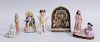 INDIAN PAINTED PORCELAIN ARCHED SHRINE AND FIVE OTHER INDIAN PORCELAIN FIGURAL GROUPS