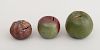 GROUP OF THREE AMERICAN REDWARE FRUIT-FORM COIN BANKS