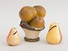 GROUP OF THREE PAINTED PLASTER FRUIT-FORM BANKS