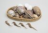 WOVEN BASKET AND A COLLECTION OF SEA SHELLS