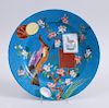 ARTS AND CRAFTS TURQUOISE-GROUND 'CLOISONNÉ' PORCELAIN CHARGER WITH PARROT