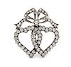 A Victorian Silver Topped Gold and Diamond Witch's Heart Brooch, 5.80 dwts.