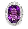 An Art Deco White Gold, Amethyst and Diamond Ring, 8.80 dwts.