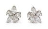 A Pair of Platinum and Diamond Cluster Earclips, 6.30 dwts.
