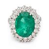A White Gold, Emerald and Diamond Ring, 6.60 dwts.
