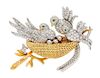 * A Platinum, Yellow Gold, Diamond and Emerald Bird Brooch, 31.20 dwts.