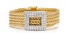 An 18 Karat Bicolor Gold and Diamond Bracelet, 22.80 dwts.