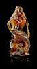 A "Blue" Amber Mermaid, Lee Downey,, United States,, exquisitely carved from a single large amber nugget. The mermaid figure is