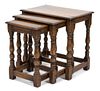 A Set of Three Jacobean Style Oak Nesting Tables Height 20 x width 20 1/2 x depth 14 inches.