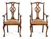 A Pair of Chippendale Style Walnut Arm Chairs Height 42 inches.