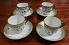 Set of four Flora Danica tea cups and saucers