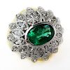 Vintage Oval Cut Emerald, Marquise Cut Diamond and 14 Karat Yellow and White Gold Ring.
