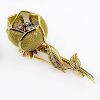 Retro Merrin France Approx. 1.25 Carat Round Brilliant Cut Diamond and 18 Karat Yellow Gold Articulated Flower Brooch.