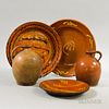 Three Slip-decorated Redware Pottery Dishes and Two Redware Jugs, dia. to 13 1/2 in.