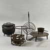 Six Wrought and Cast Iron Hearth Items, including a rotating broiler, a posnet, and a cauldron.