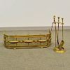 Five Brass Fireplace Accessories, a fender, poker, shovel, tongs, and stand.