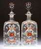 BLOWN AND DECORATED PAIR OF COLOGNE BOTTLES