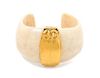 A Chanel Goldtone and Cream Cuff, 7" circumference.