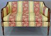 Southwood Sheraton style upholstered loveseat. ht. 34in., wd. 49in.