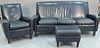 Stickley three piece set including Craftsman leather chair (ht. 36in.), ottoman, and sofa (lg. 70in.).