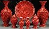 A SEVEN PIECE GROUP OF CHINESE CARVED CINNABAR