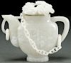 A CHINESE CARVED WHITE JADE ORNAMENTAL TEAPOT