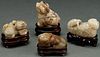 A GROUP OF FOUR CHINESE CARVED JADE FIGURAL