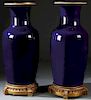 A PAIR OF SEVRES STYLE COBALT GROUND PORCELAIN