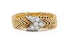 An 18 Karat Bicolor Gold and Diamond Ring, Paloma Picasso for Tiffany & Co., 6.10 dwts.