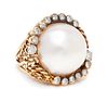 A Yellow Gold, Cultured Mabe Pearl and Diamond Ring, 11.30 dwts.