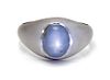 A 14 Karat White Gold and Star Sapphire Ring, 4.45 dwts.