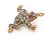 A Gilt Silver, Diamond and Ruby Frog Motif Brooch, 17.60 dwts.