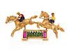 A Yellow Gold and Polychrome Enamel Horse Jumping Brooch, 6.40 dwts.