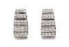 * A Pair of 14 Karat White Gold and Diamond Earclips, 9.00 dwts.
