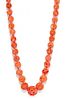 A Graduated Single Strand Coral Bead Necklace,