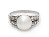 A Platinum, Diamond and Cultured Pearl Ring, 4.50 dwts.