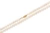 A Single Strand Yellow Gold and Cultured Pearl Necklace,