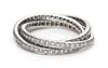 A White Gold and Diamond Triple Rolling Ring, 4.40 dwts.