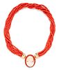 An 18 Karat Yellow Gold, Coral and Shell Cameo Convertible Pendant/Brooch Torsade Necklace,