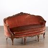 Louis XV carved walnut canape