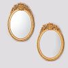 Large pair French Rococo oval giltwood mirrors