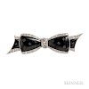Art Deco Platinum, Onyx, and Diamond Bow Brooch, J.E. Caldwell & Co., the onyx with engraved accents, framed by single-cut di