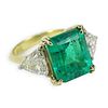 Vintage Approx. 4.98 Carat Emerald, .75 Carat Trillion Cut Diamond and 18 Karat Yellow Gold Ring.