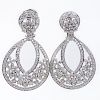 Van Cleef & Arpels Style Approx. 7.24 Carat Round Brilliant Cut Diamond and 18 Karat White Gold Chandelier Earrings.