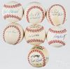 Seven signed baseballs