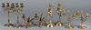 Four pairs of figural brass candlesticks