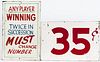 Group of painted masonite signs