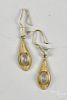Pair of 18K yellow gold and opal earrings 2.6 dwt.