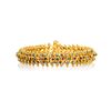 An Indian High Karat Gold and Gemstone Bracelet