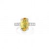 A Yellow Sapphire and Diamond Ring